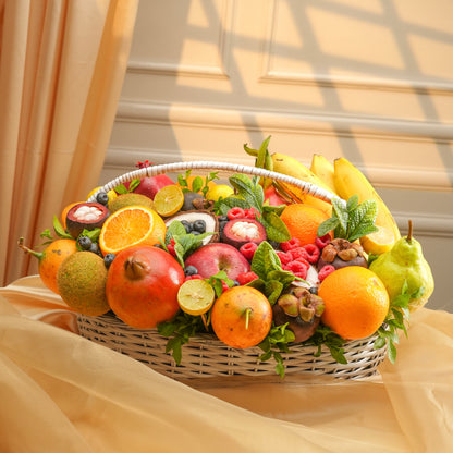 Fruit basket with various fruits on a beige fabric background